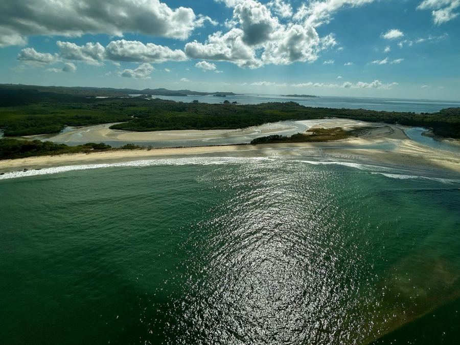 A river estuary opening to the Pacific